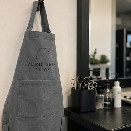 Customized aprons for salons and studios